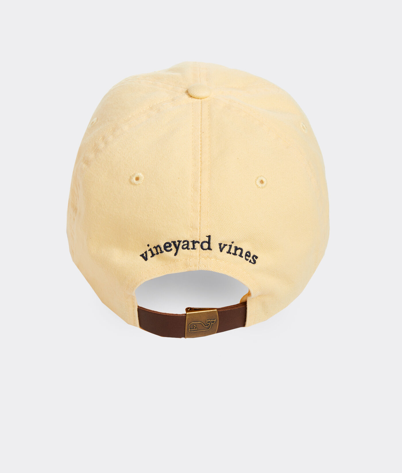 tan hat with leather strap