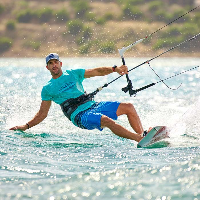 man kitesurfing