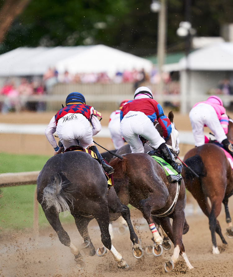 horses racing at Churchill Downs

