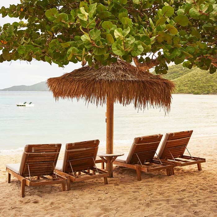 beach chairs on shore