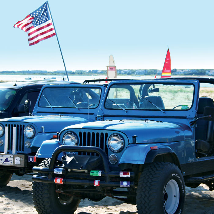 Jeep on beach shore