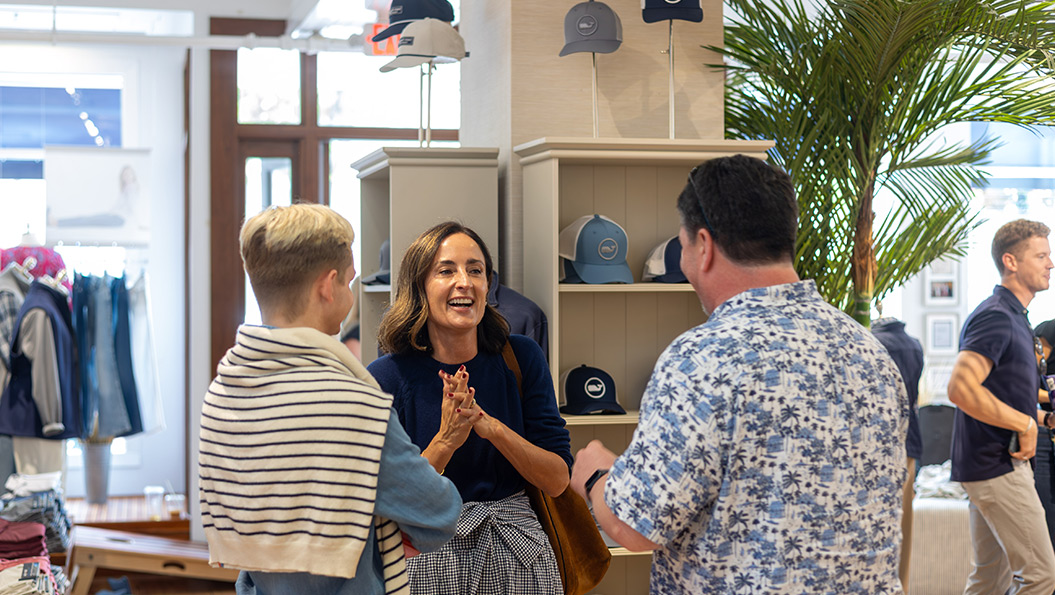vineyard vines employee ringing up customer